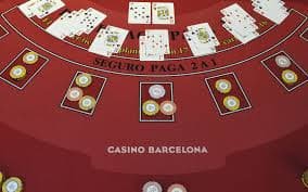 Mobile phone displaying live blackjack table with betting controls and video feed